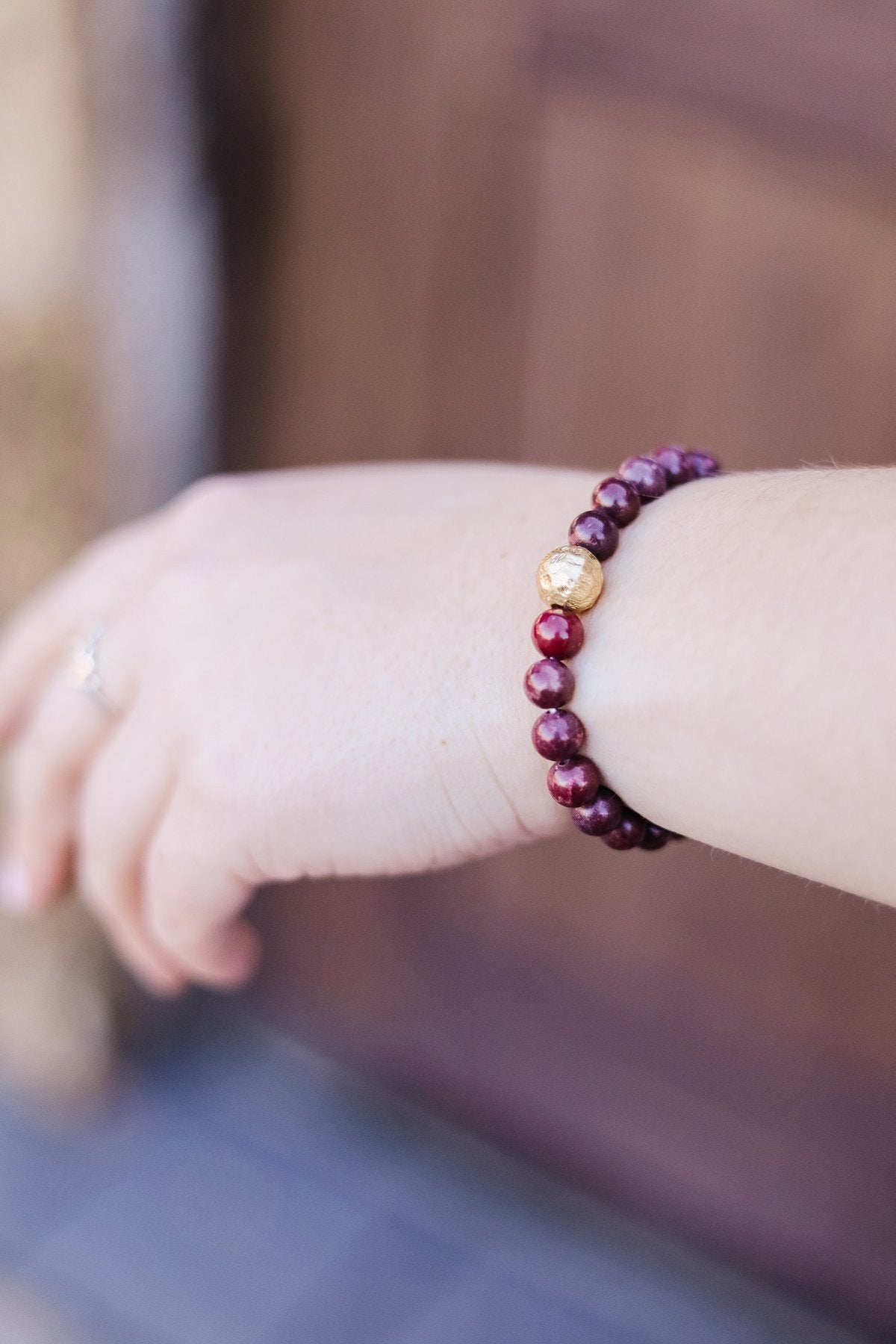 Touch Of Gold Stone Bracelet In Wine