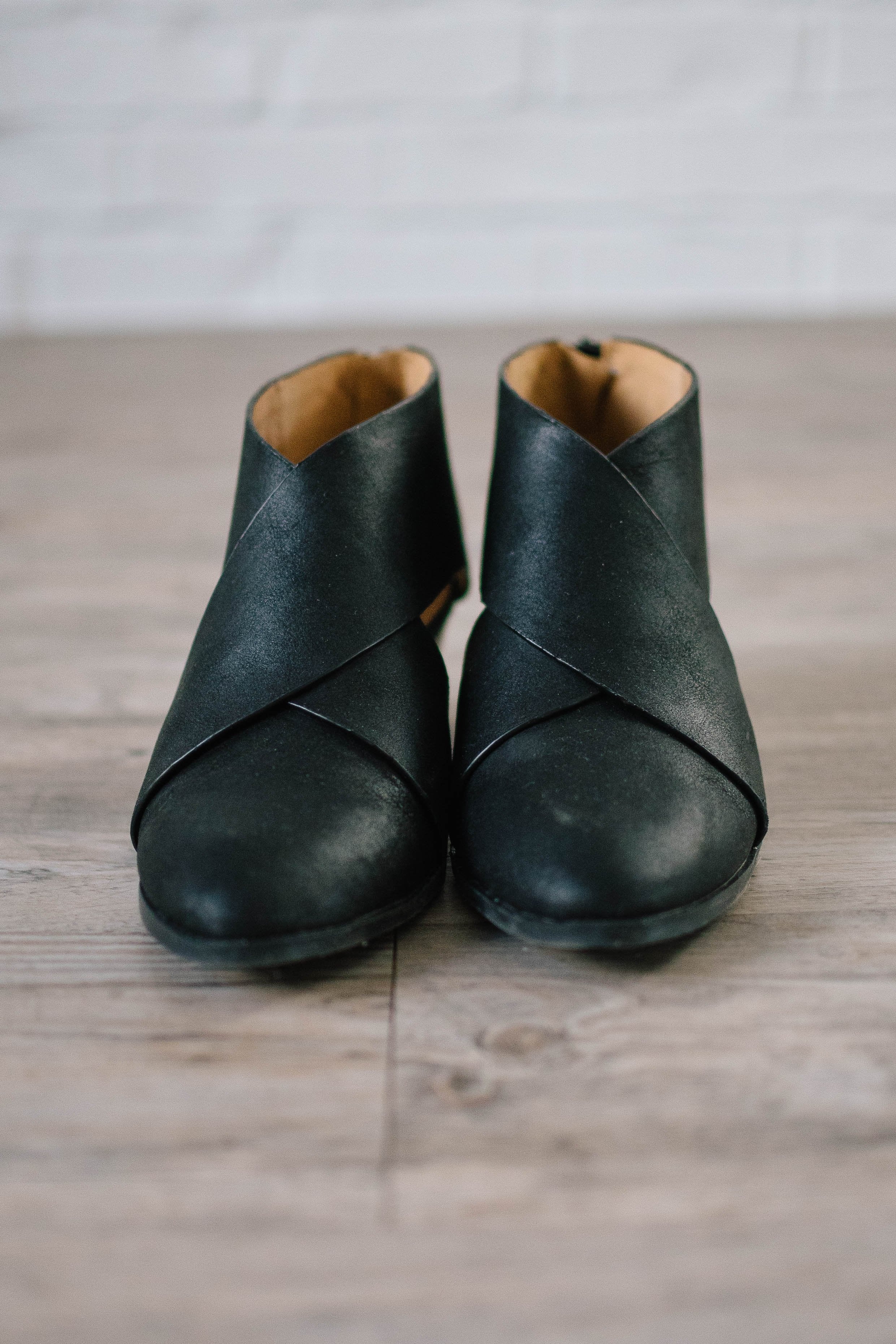 Distressed Side Cutout Booties in Black