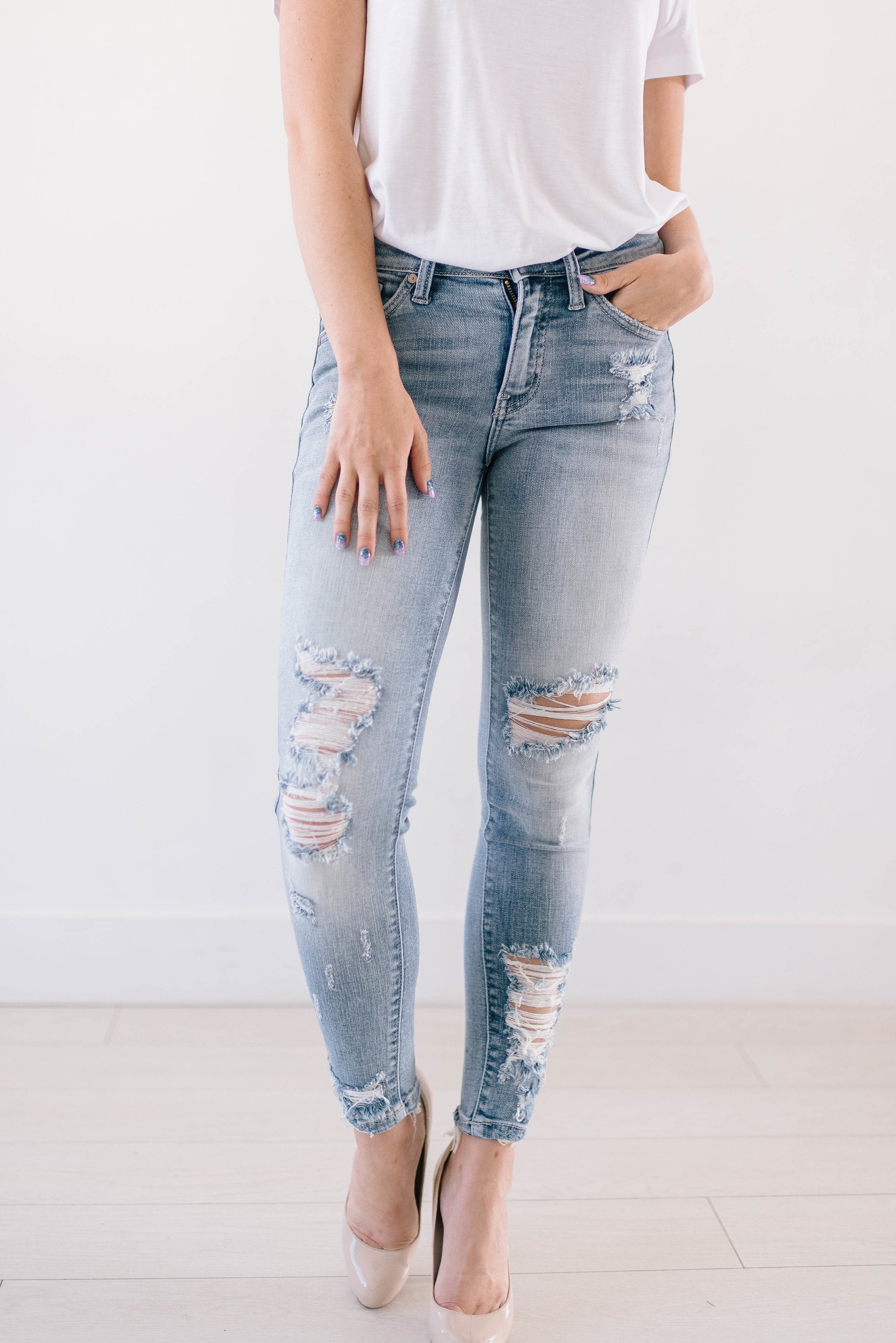 Light Wash Distressed Denim Skinnies