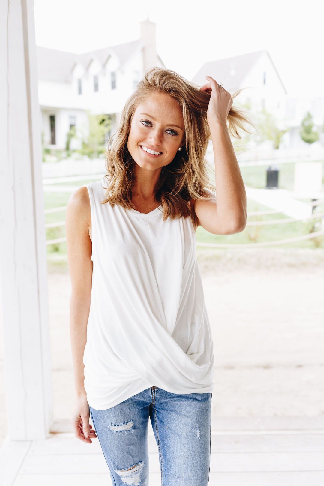 Sleeveless Twist And Cross Top In Ivory