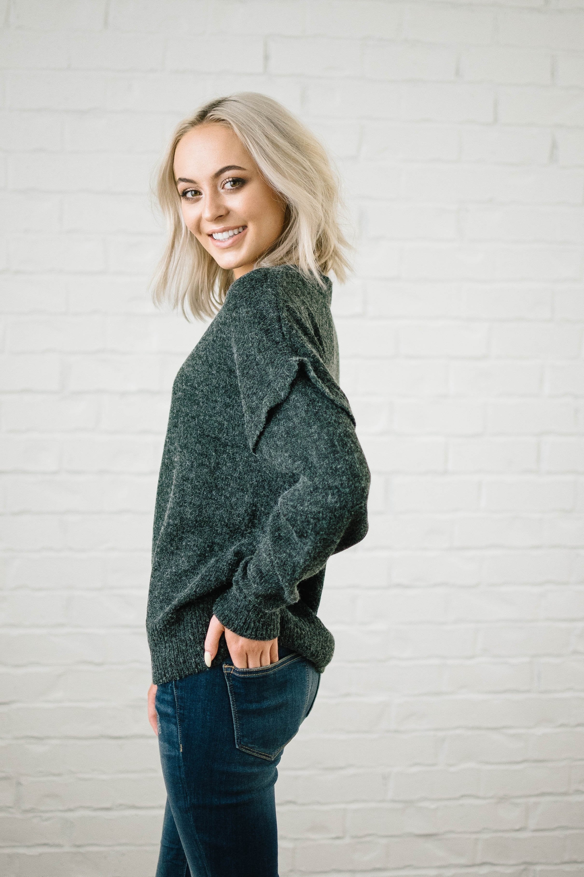 The Rosslyn Ruffle Sweater in Charcoal