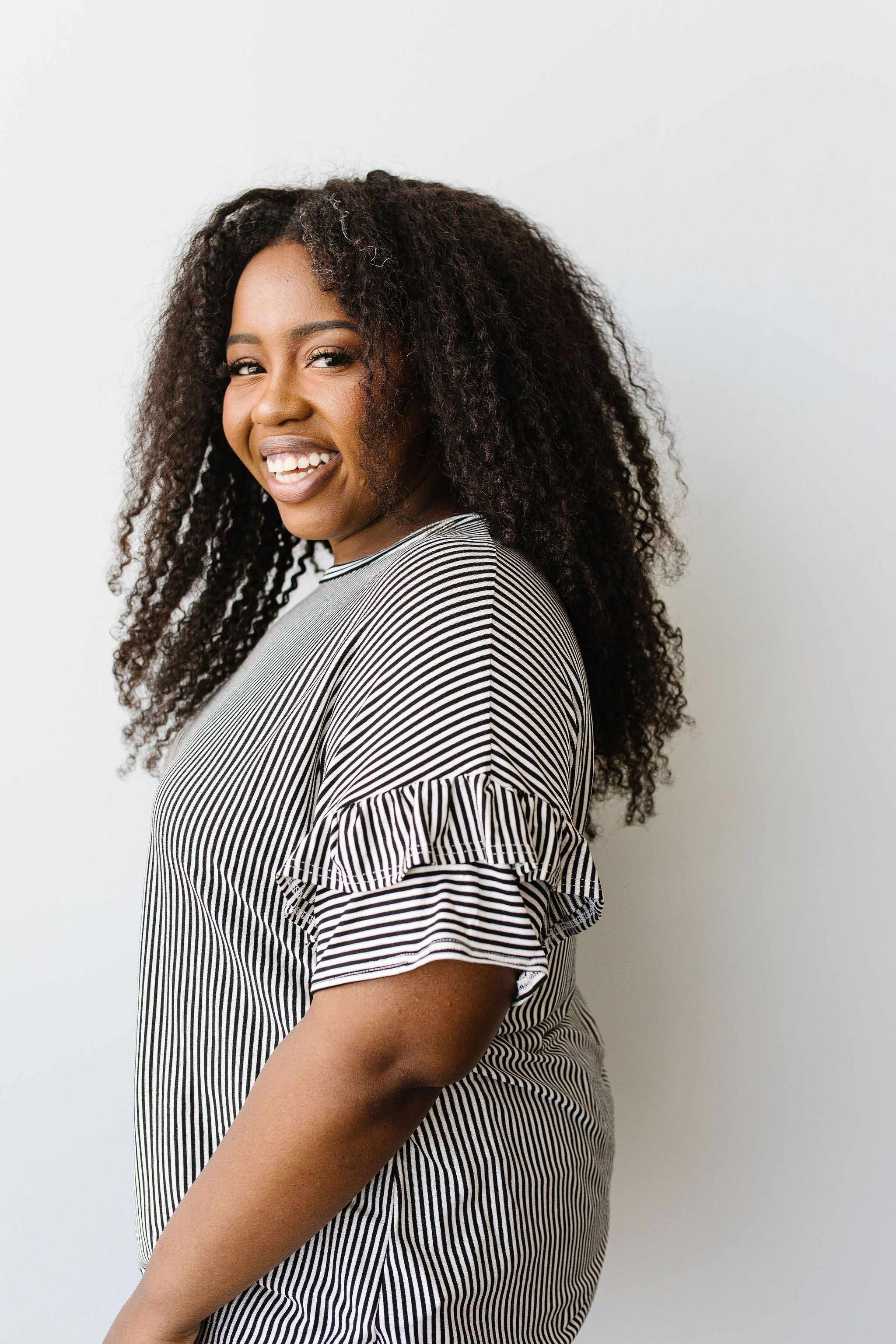 Vertical Horizon Striped Top In Black