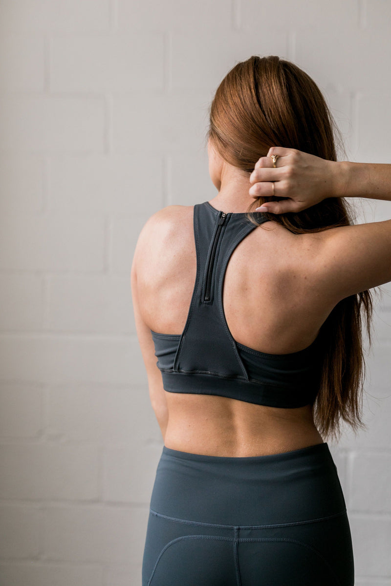 Ahead Of the Curve Sports Bra In Pine