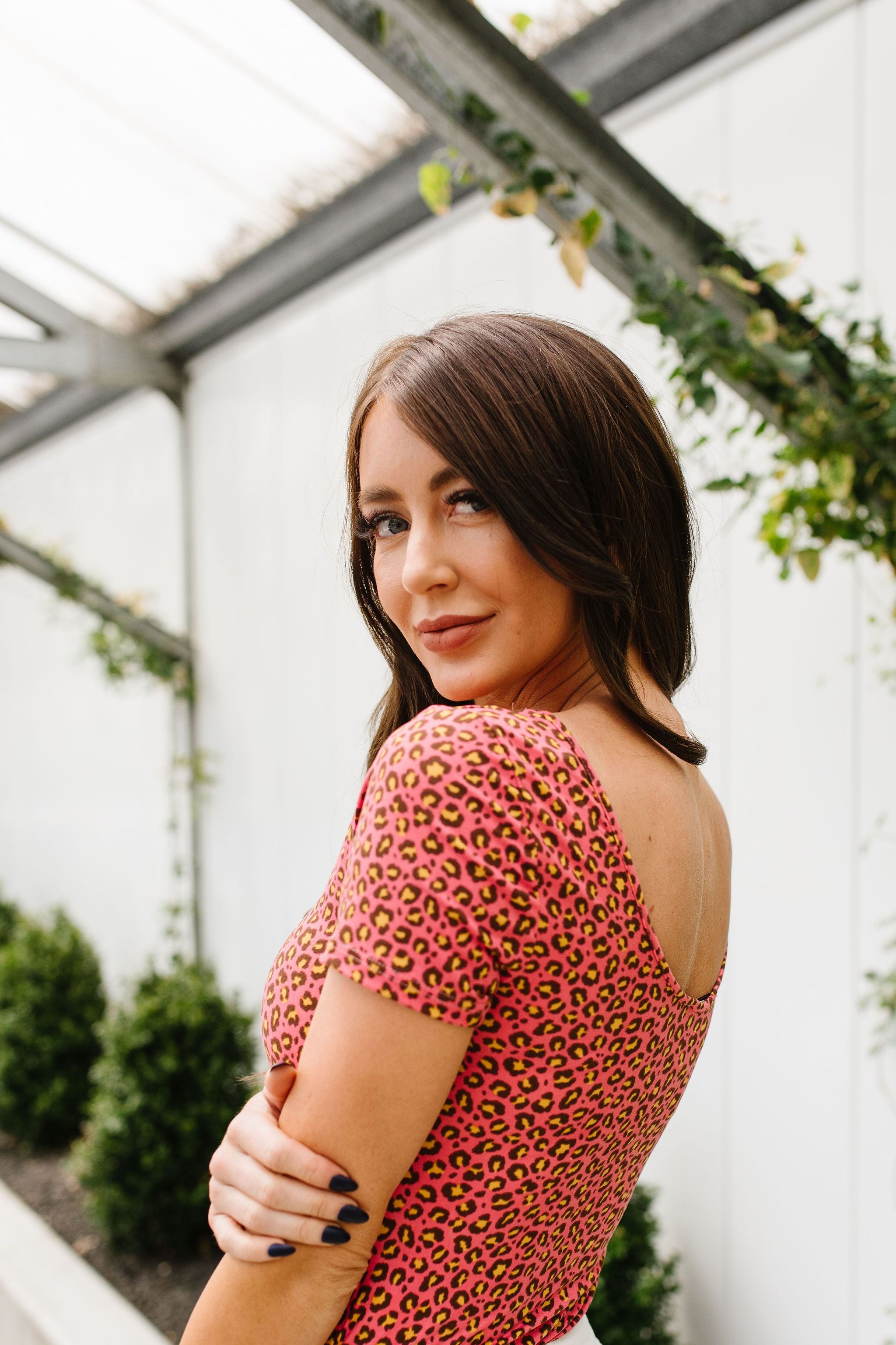 Sultry Spotted Bodysuit In Rose